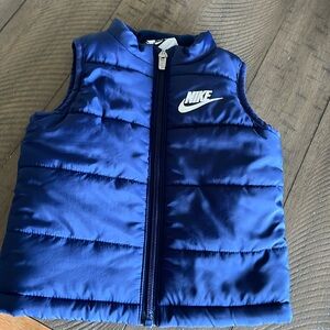 Barley worn baby 12 month navy Nike vest